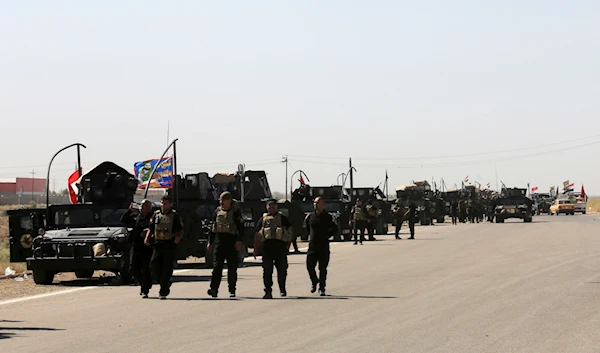 Iraqi military forces prepare for an offensive into Fallujah to retake the city from Islamic State militants in Iraq, Friday, June 3, 2016 (AP Photo/ Khalid Mohammed)