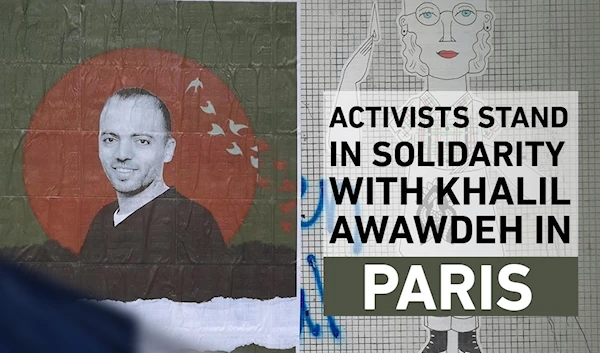 Activists stand in solidarity with Khalil Awawdeh in Paris