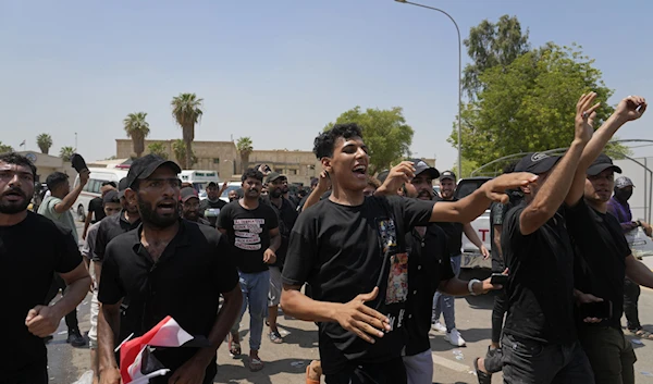 Supporters of Muqtada al-Sadr protest in front the Supreme Judicial Council, in Baghdad, Iraq, August 23, 2022 (AP Photo)