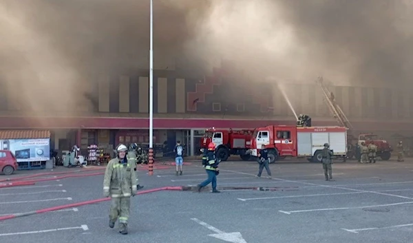 Firefighters at the Galaktika Mall in Donetsk (Jaun English)