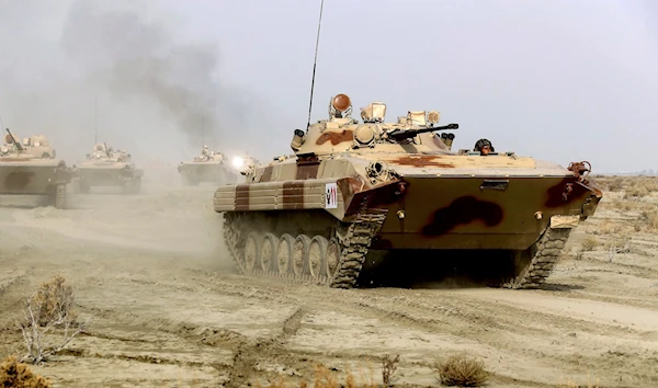 This photo released January 19, 2021, by the Iranian Army, shows tanks moving during a military drill. (Iranian Army)