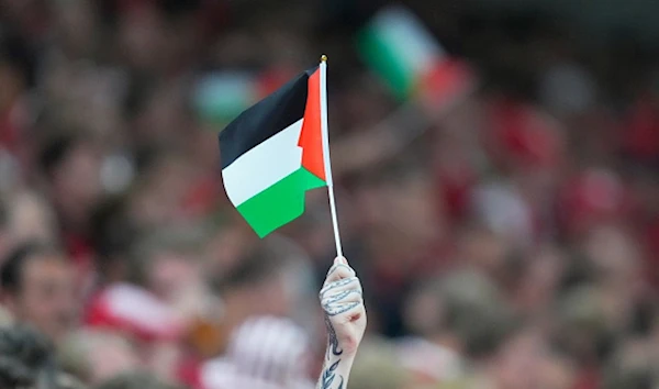 British clubs and players wave Palestinian flags [Getty].