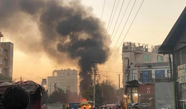 Smoke rise on the sky following a bomb explosion in Kabul (AP Photo)