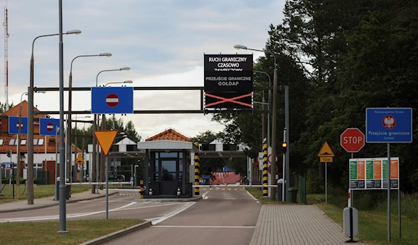 A welcome to European Union sign stand at the closed border crossing between Poland and Kaliningrad Oblast, in Goldap, Poland, Thursday, July 7, 2022. (AP Photo/Michal Dyjuk)