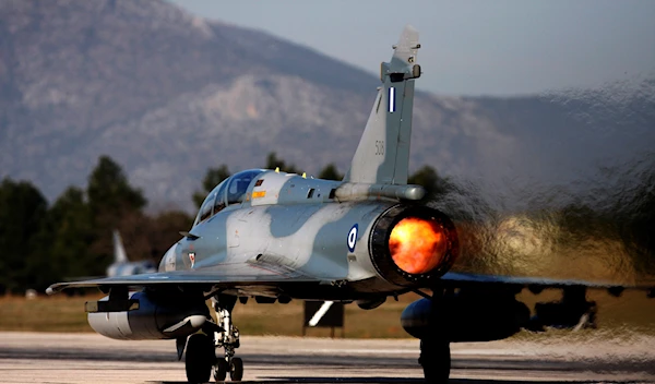 An Mirage 2000-5 takes off at Tanagra Air Force base, north of Athens, Greece on Tuesday, Jan. 20, 2009 (AP Photo/Dimitri Messinis)