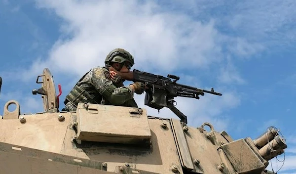 A soldier takes part in the live fire Han Kuang military exercise (REUTERS)