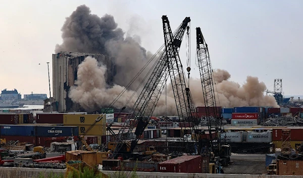 Parts of damaged Beirut port silos collapse on blast anniversary