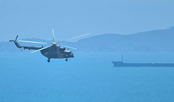 A Chinese military helicopter by Pingtan Island across the Taiwan Strait (AFP)