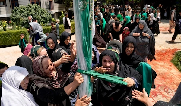 Afghans attend a mourning ceremony three days ahead of Ashoura to mark Ashoura, in a mosque in Kabul, Afghanistan, Friday, Aug. 5, 2022 (AP Photo/Ebrahim Noroozi)