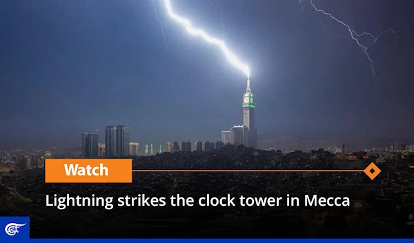 Lightning strikes the clock tower in Mecca