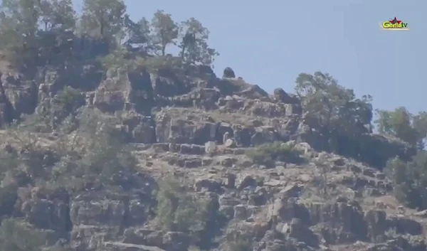 Screen grab from a PKK/HPG released footage of an attack on TAF/TSK position in Zap Region on June 11, 20221 using a Konkurs Anti tank guided missile