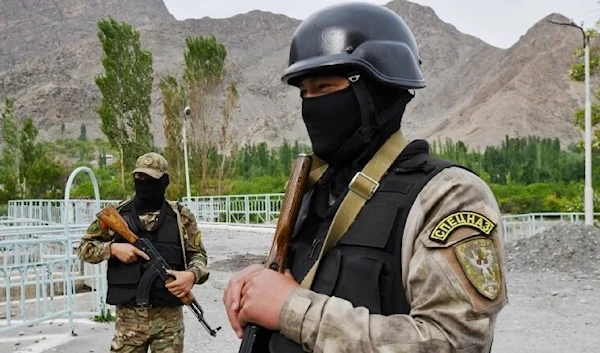 Kyrgyz soldiers guard a water supply facility outside the village of Kok-Tash near Kyrgyzstan-Tajikistan border in southwestern Kyrgyzstan. (AP)