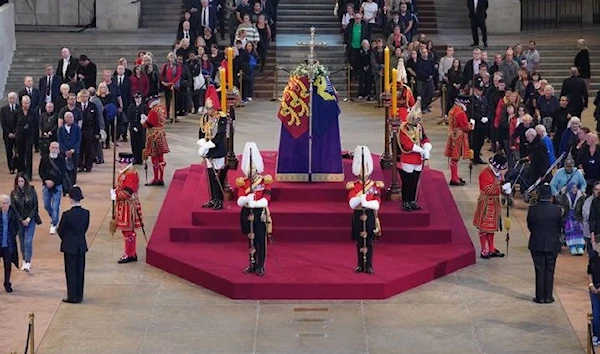 British Royal Guard collapses near the Queen's coffin on Livestream