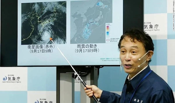 A director of the Japan Meteorological Agency's Forecast Division during a news conference on Typhoon Nanmadol in Tokyo on September 17, 2022.