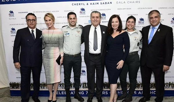 Hollywood celebrities, including famed producer Haim Saban and actress Fran Drescher, pose with IDF soldiers at the FIDF Western Region Gala.