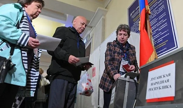 People visiting a polling station