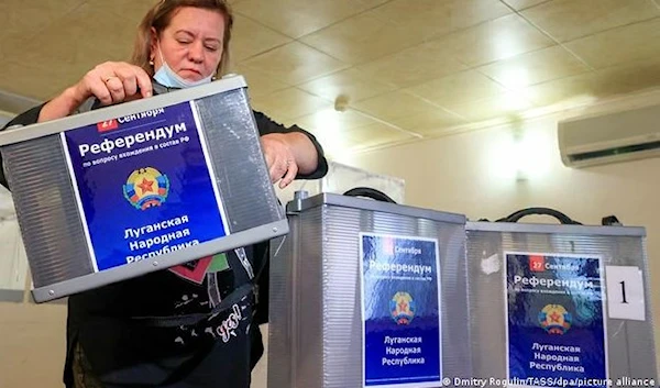 A woman voting in referendum