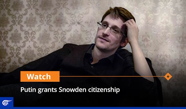 Putin grants Snowden citizenship