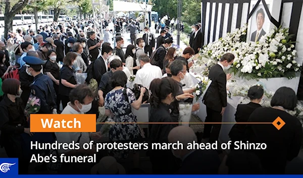 Hundreds of protesters march ahead of Shinzo Abe’s funeral