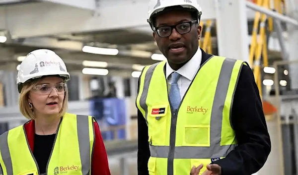 Liz Truss and Kwasi Kwarteng during a visit to a modular housing factory in Northfleet. (Reuters)