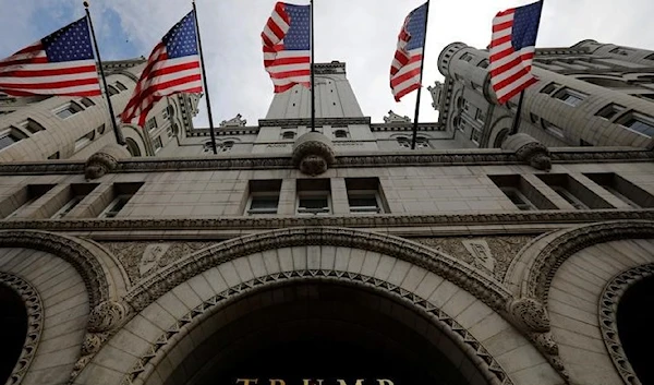 US flags fly over the Trump International Hotel in Washington, US, August 3, 2018. (REUTERS)