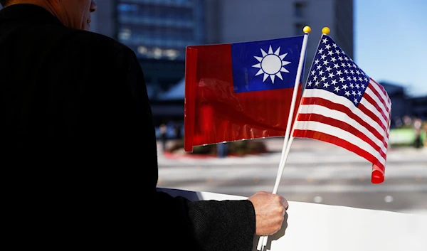 US and Taiwan flags (Reuters)