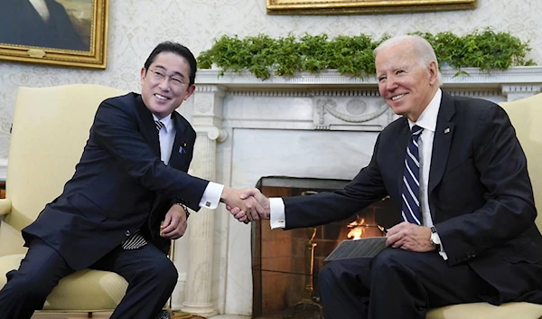 President Joe Biden shakes hands with Japanese Prime Minister Fumio Kishida as they meet in the Oval Office of the White House, Friday, Jan. 13, 2023, in Washington. (AP)