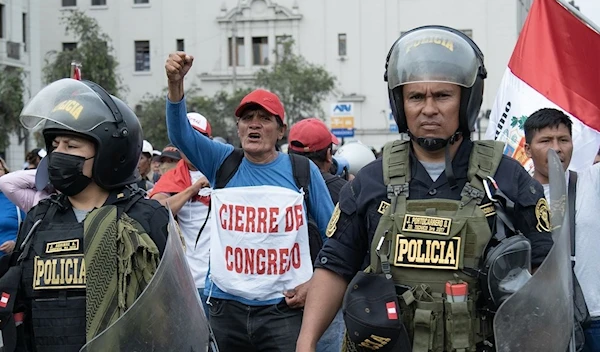 Supporters of Pedro Castillo protest his ousting and arrest in Lima (Bloomberg)