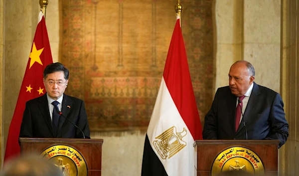 Chinese Foreign Minister Qin Gang, left, listens during a press conference with his Egyptian counterpart Sameh Shoukry, at the foreign ministry headquarters in Cairo, Egypt, Sunday, Jan. 15, 2023 (AP Photo/Amr Nabil)