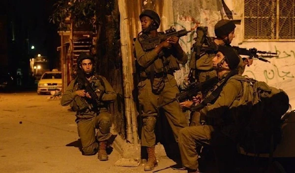 IOF forces raiding Qabatiya town