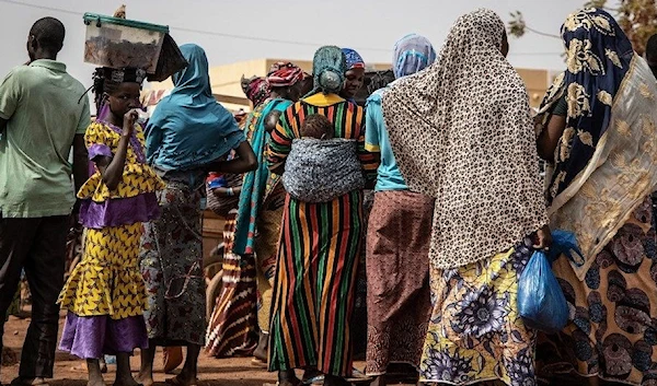 Women and children stand outside the city hall, in Kaya, on January 22, 2020. Copyright © africanews OLYMPIA DE MAISMONT/AFP