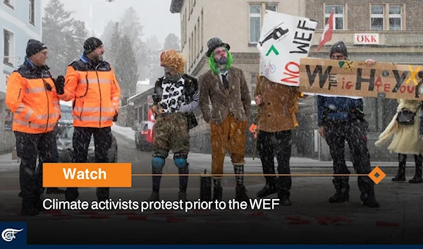 Climate activists protest prior to the WEF