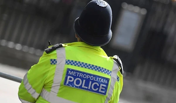 A Metropolitan Police officer stands on duty in Westminster, London. (REUTERS)