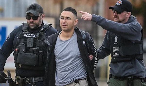 Solomon Pena, center, a Republican candidate for New Mexico House District 14, is taken into custody, Jan. 16, 2023. (AP)