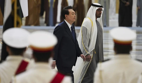 South Korean President Yoon Suk Yeol received an honor guard welcome Sunday on a trip to the UAE (AP)