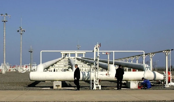 Workers check the Blue Stream gas pipeline in Samsun, northern Turkey, on Nov. 16, 2005. - MUSTAFA OZER/AFP