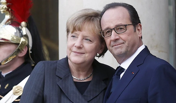 French President Francois Hollande (R) and German Chancellor Angela Merkel. Source: Thierry Chesnot/Getty Images