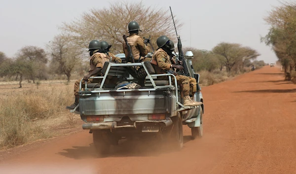 Soldiers patrolling in the Sahel area in 2019 in Burkina Faso (Reuters)