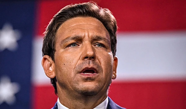 Florida governor Ron DeSantis speaks during an election night watch party in Florida in November 2022 (AFP)