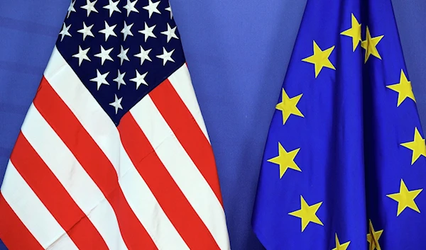 The US flag (L) and European Union flag (R) (AFP)