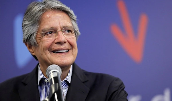 Ecuador's President Guillermo Lasso reacts as he speaks to media in Ecuador. (REUTERS)