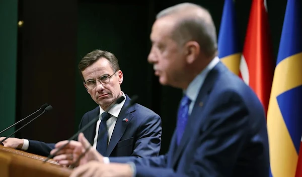 Turkish President Recep Tayyip Erdogan and Swedish Prime Minister Ulf Kristersson holding a joint news conference in Ankara in November 2022 (Anadolu Agency)