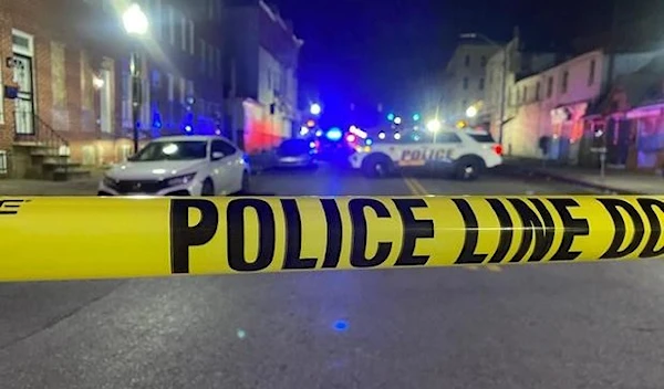 At the scene of a shooting and car crash in Baltimore, Maryland. Jan. 28, 2023. (AP)