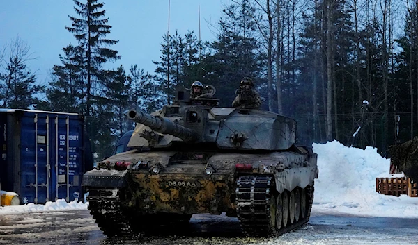 Britain's Challenger 2 tank moves at the Tapa Military Camp, in Estonia, Thursday, Jan. 19, 2023 (AP Photo/Pavel Golovkin)