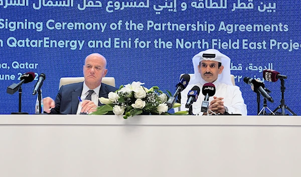 Eni CEO Claudio Descalzi and Qatar's Minister of State for Energy and CEO of QatarEnergy Saad Al-Kaabi attend the signing ceremony of their partnership for the North Field East Project in Doha, Qatar, June 19, 2022 (Reuters)