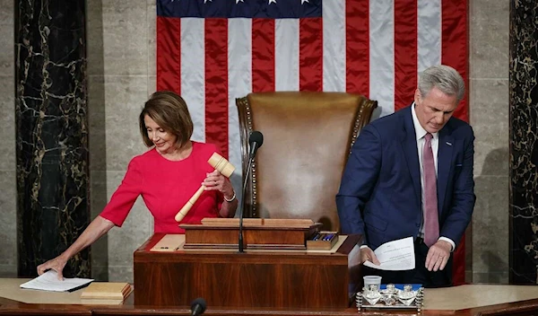 Nancy Pelosi holds the gavel as Rep. Kevin McCarthy leaves the dais, Thursday, Jan. 3, 2019 (AP)