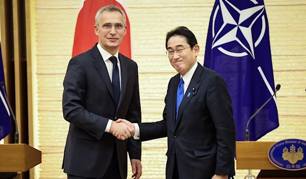 NATO Secretary-General Jens Stoltenberg and Japan's Prime Minister Fumio Kishida shake hands after holding a joint media briefing on January 31, 2023 in Tokyo, Japan (Reuters).