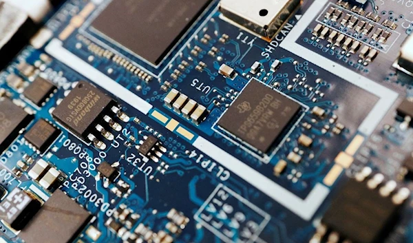 Semiconductor chips are seen on a circuit board of a computer in this illustration picture taken February 25, 2022. (REUTERS)