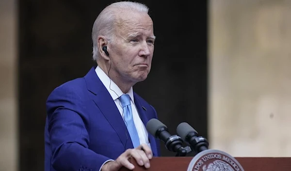 President Joe Biden listens during a news conference with Mexican President Andres Manuel Lopez Obrador and Canadian Prime Minister Justin Trudeau at the 10th North American Leaders' Summit at the National Palace in Mexico City, January 10, 2023 (AP).