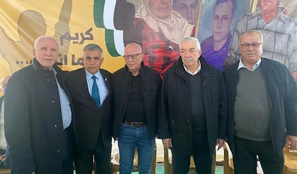 Mahmud al-Alul, Azzam al-Ahmad and Rawhi Fattouh with freed prisoner Karim Younis (Social media)